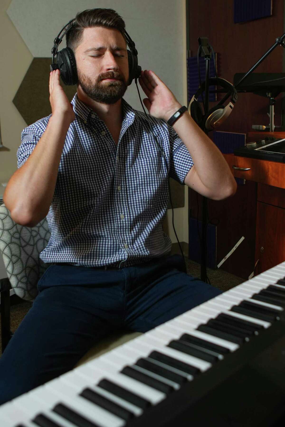 John Head, board certified music therapist, poses for a portrait in a music therapy room at Houston Methodist Hospital.