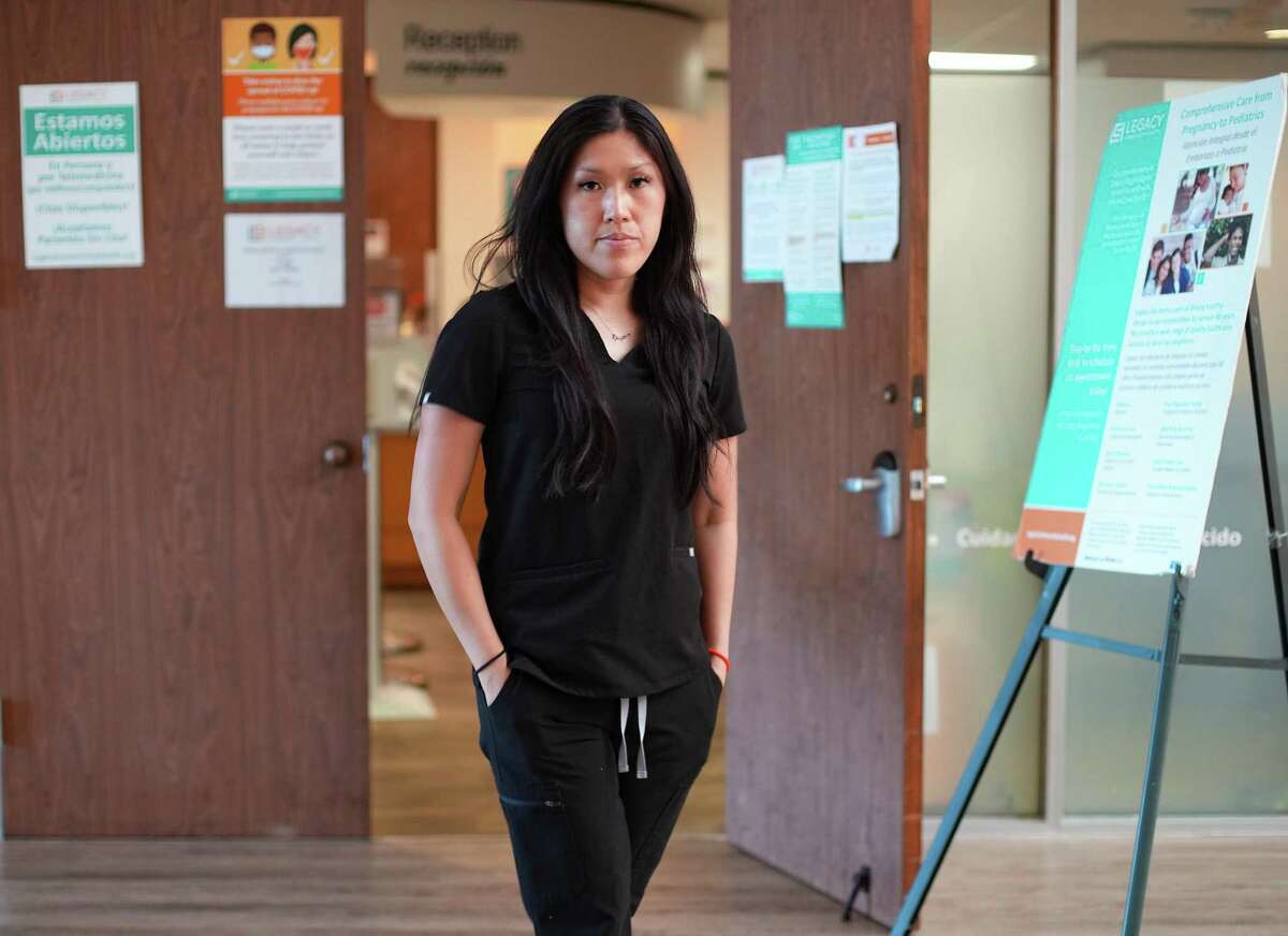 Dr. Vian Nguyen, an OB-GYN stands outside the Legacy Community Health Clinic on Monday, July 11, 2022 in Houston.