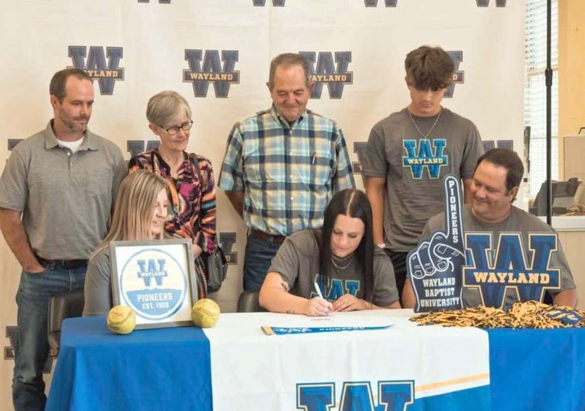 On Thursday afternoon in the foyer of Gates Hall, Littlefield native, Bailey Jones, signed her LOI to play softball for Wayland Baptist University, making her the Pioneers first softball commitment. She was joined at her signing by family, WBU Coaches and staff members.(Front L-R): Shayla Jones, Bailey Jones and Gary Jones.(Back L-R):Marty Jones, Bobbie Jones, Johnny Jones and Brady Jones.