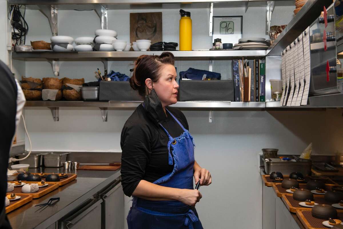 Kim Alter of Nightbird making sure tickets are all accounted during dinner service.