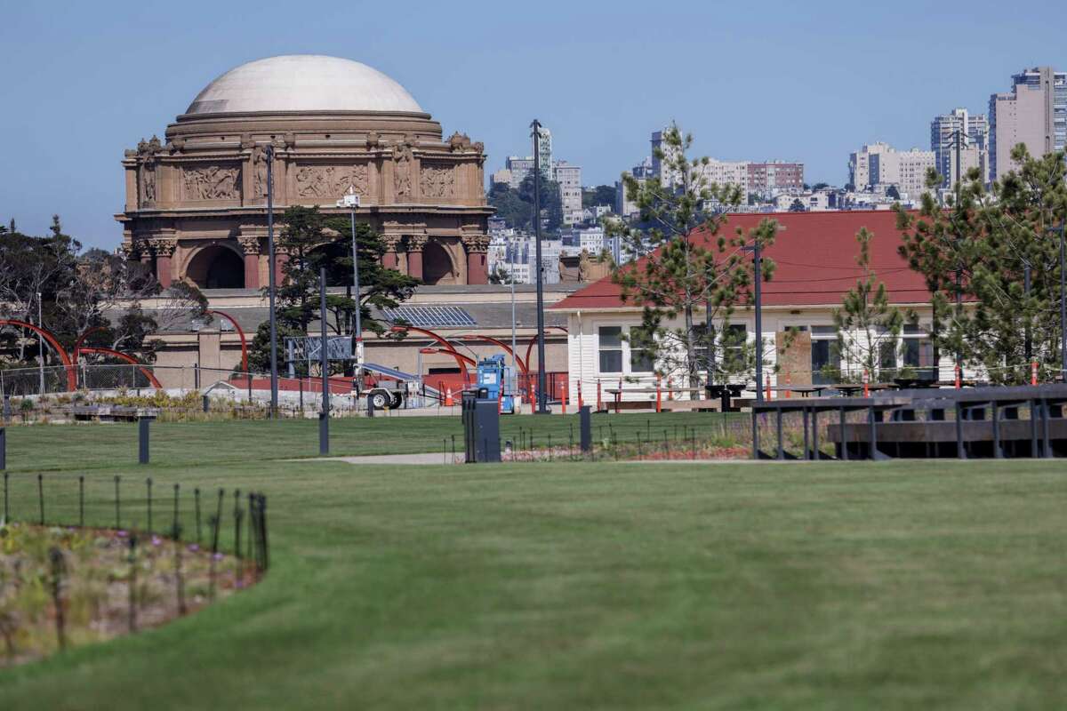 The Palace of Fine Arts can be seen from the lawns at Tunnel Tops Park above Presidio Parkway in San Francisco.