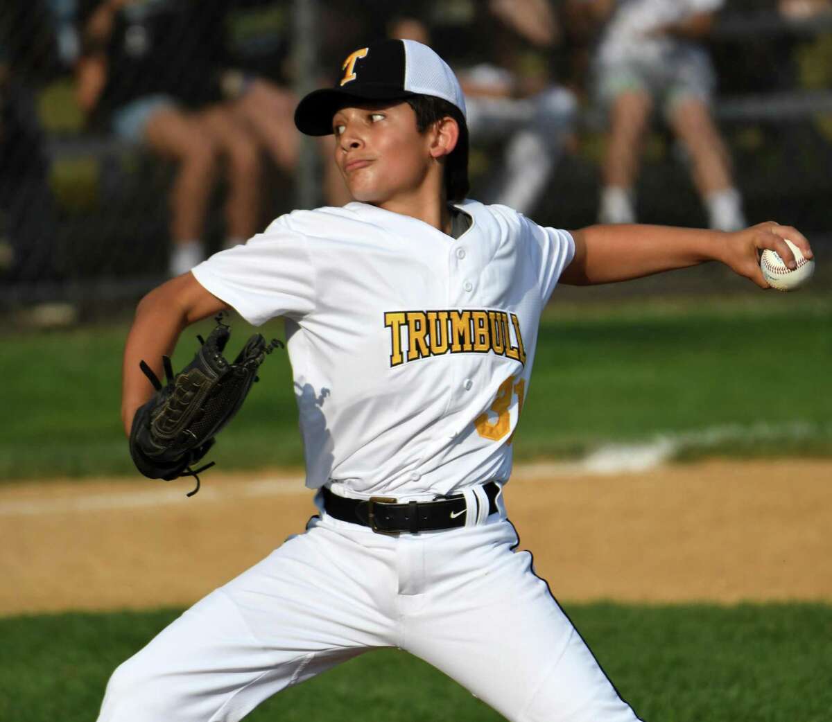 Trumbull's Brayden Showah pitches during the 12-under District 2 championship game between Fairfield American and Trumbull at Unity Park, Trumbull on Friday, July 15, 2022.