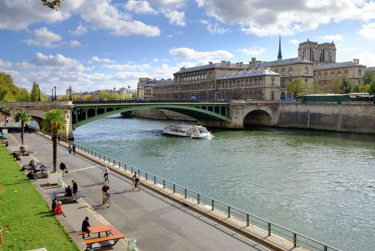 Paris has made routes for cyclists and pedestrians a priority, including at the Voie George Pompidou path alongside the Pont Notre-Dame bridge.