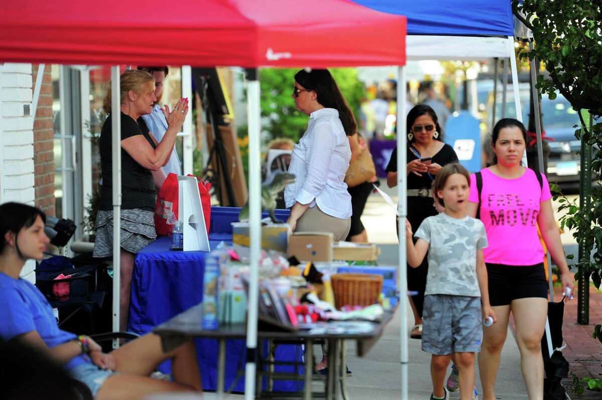 The Darien Chamber of Commerce’s Darien Sidewalk Sales event for businesses up and down Post Road in Darien, Conn., on Friday July 15, 2022. The sidewalk sales will also run from July 16, 10 a.m. to 5 p.m.