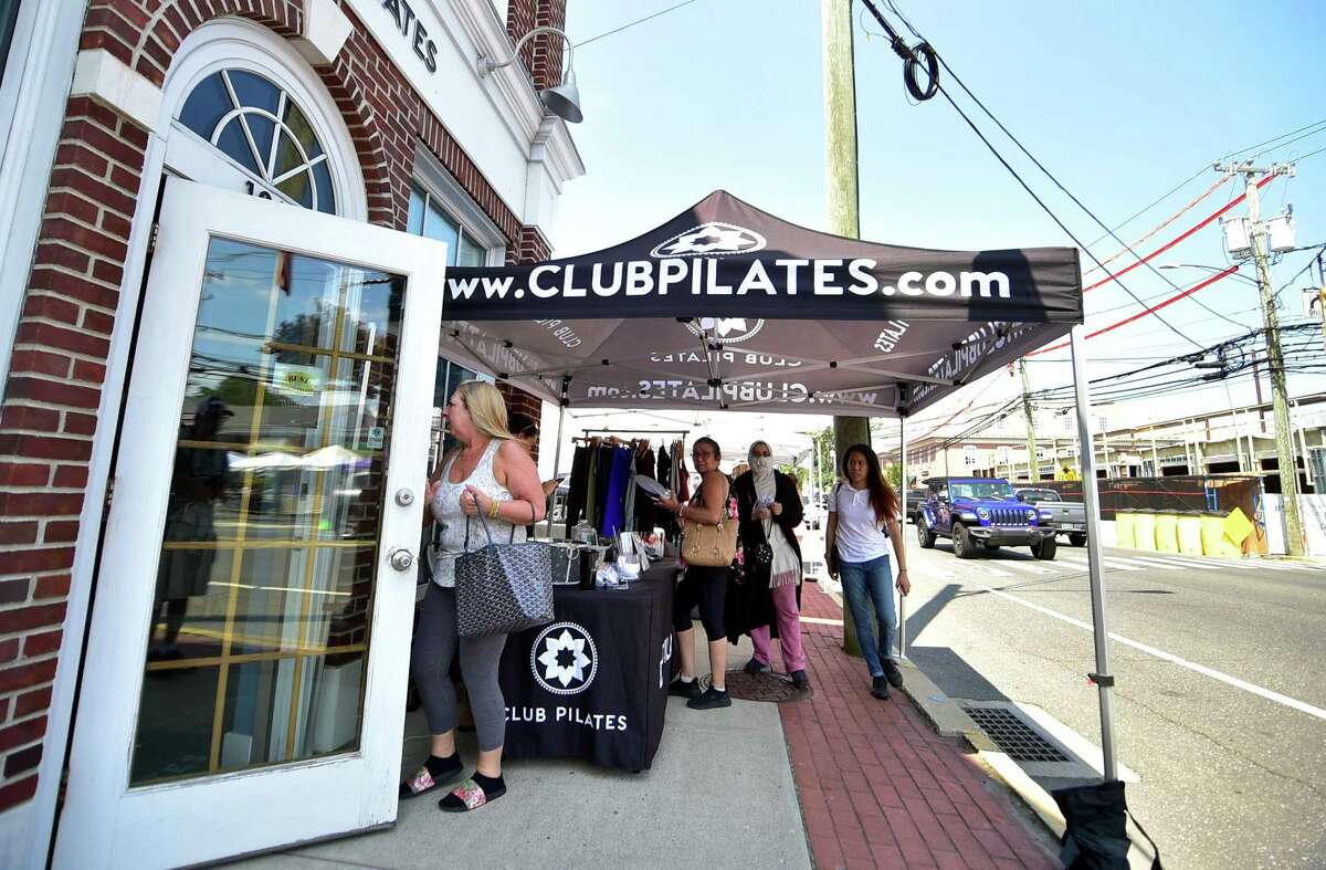 The Darien Chamber of Commerce holds its Darien Sidewalk Sales event for businesses up and down Post Road in Darien, Conn., on Friday July 15, 2022. The sidewalk sales will also run from July 16, 10 a.m. to 5 p.m.