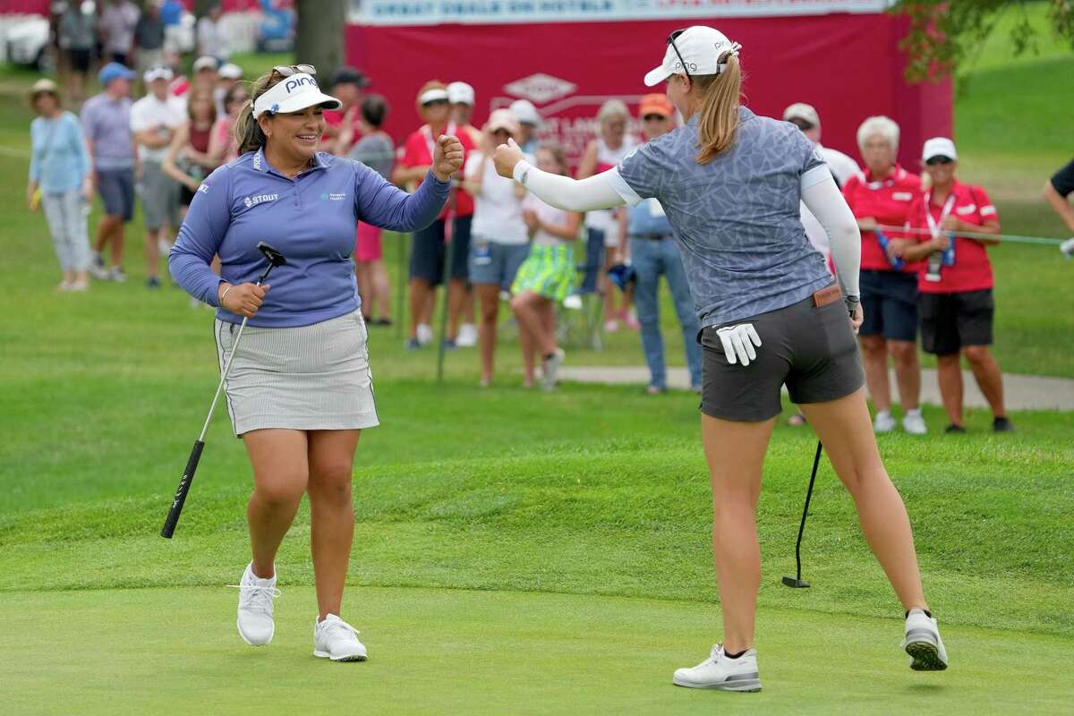 MIDLAND, MICHIGAN - JULY 15: Lizette Salas of the United States (L) and Jennifer Kupcho of the United States celebrate after making birdie on the 17th green during the third round of the Dow Great Lakes Bay Invitational at Midland Country Club on July 15, 2022 in Midland, Michigan. (Photo by Dylan Buell/Getty Images)