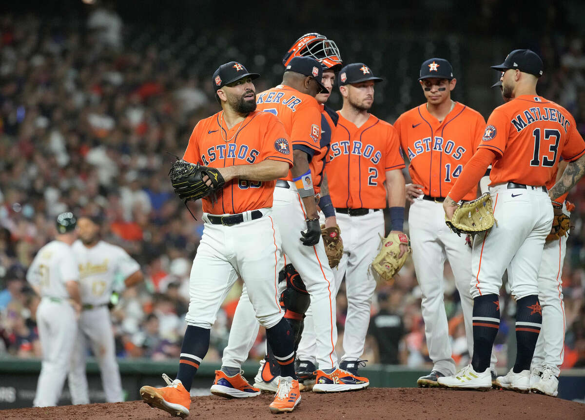 Houston Astros manager Dusty Baker Jr. (12) pulls starting pitcher Jose Urquidy (65) after Oakland Athletics shortstop Elvis Andrus drove in a run during the seventh inning of a MLB baseball game at Minute Maid Park on Friday, July 15, 2022 in Houston.