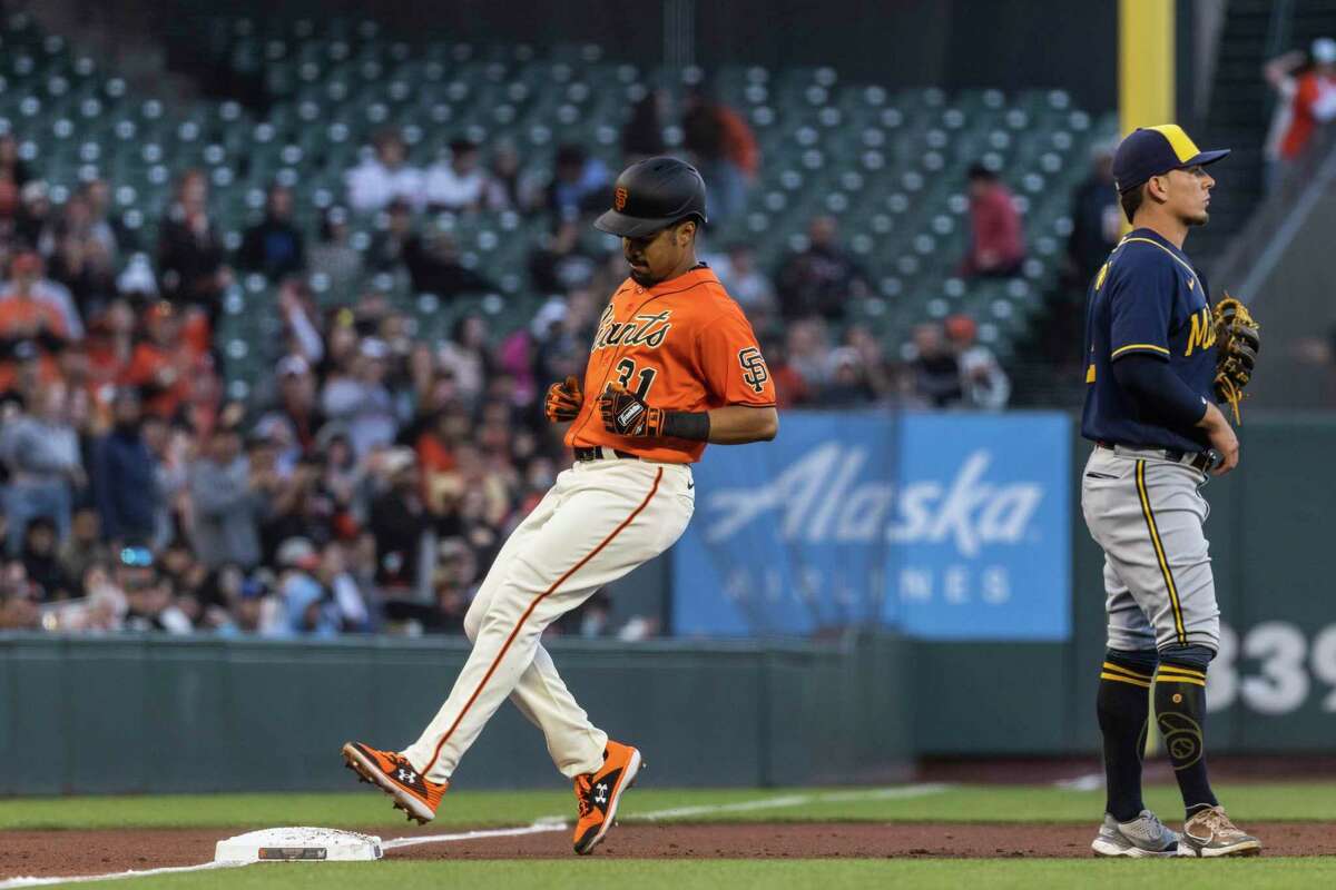 San Francisco Giants' LaMonte Wade Jr. runs reaches third base after hitting a triple during the second inning of a MLB baseball game against Milwaukee Brewers in San Francisco, Calif. Friday, July 15, 2022.
