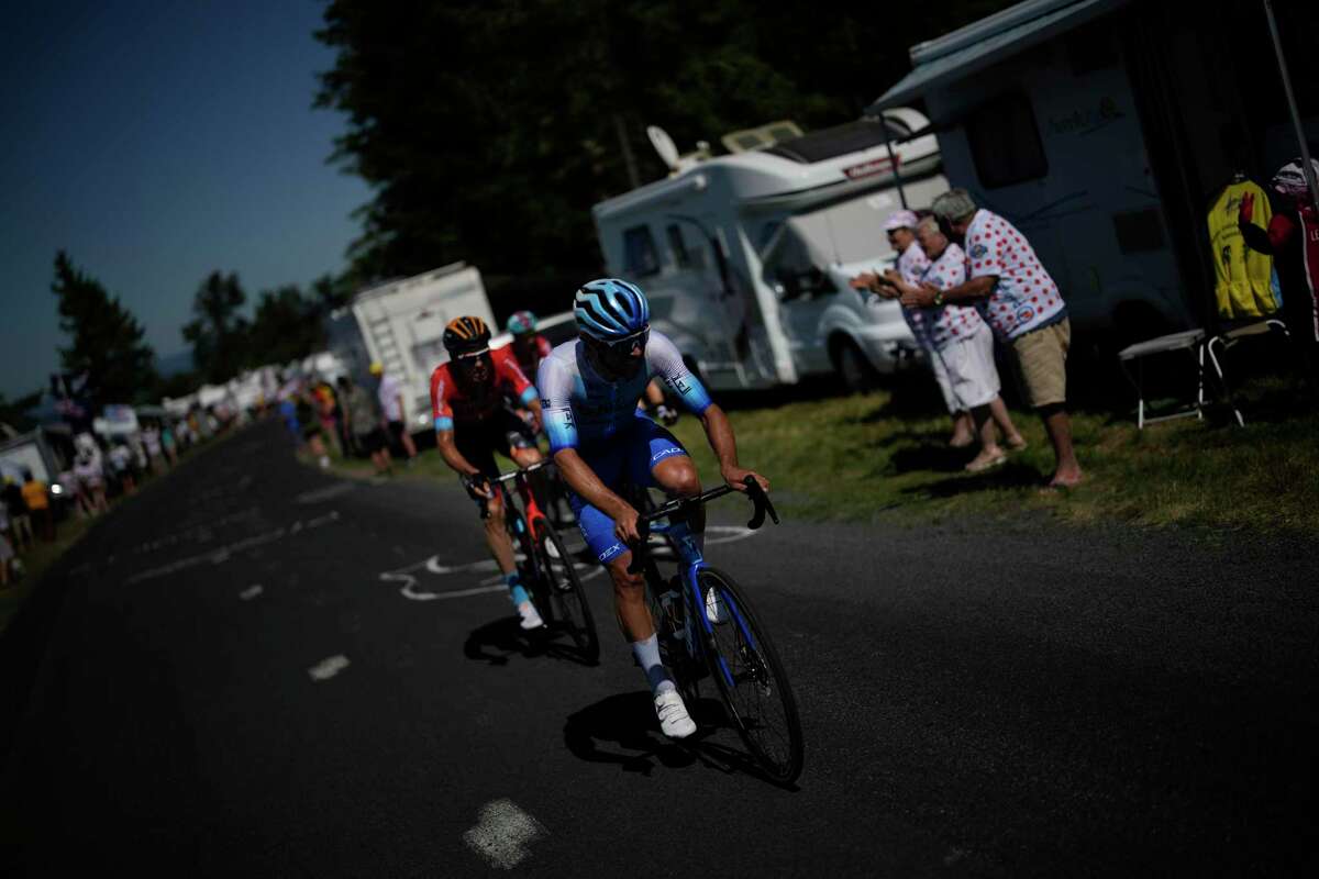 Australia’s Michael Matthews and Spain’s Luis Leon Sanchez ride Saturday in Stage 14 of the Tour de France. Matthews crossed the finish line first in the 119-mile route from Saint-Etienne to Mende.