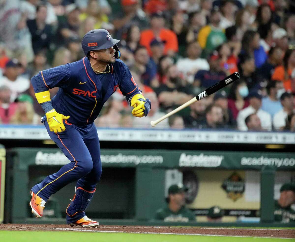 Houston Astros Yuli Gurriel (10) singles off of Oakland Athletics starting pitcher Jared Koenig (46) during the second inning of a MLB baseball game at Minute Maid Park on Saturday, July 16, 2022 in Houston.