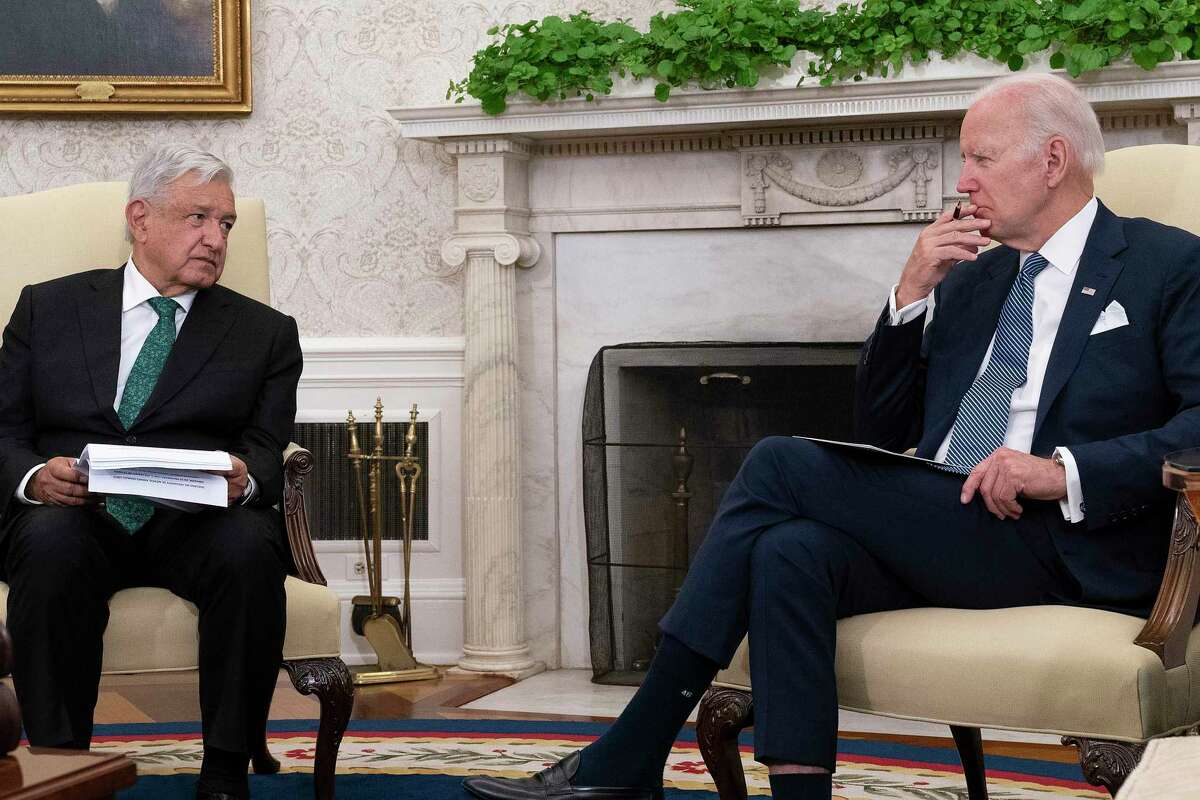 : U.S. President Joe Biden hosts Mexican President Andres Manuel Lopez Obrador in the Oval Office at the White House on July 12, in Washington.