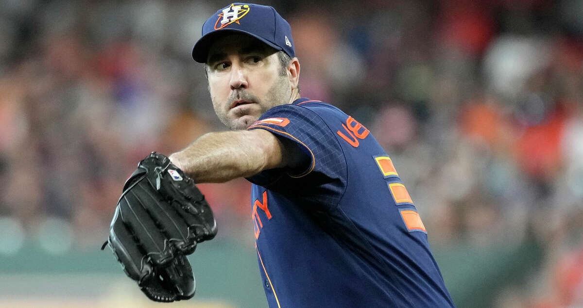 Houston Astros starting pitcher Justin Verlander (35) pitches to Oakland Athletics' Vimael Machin (31) during the first inning of a MLB baseball game at Minute Maid Park on Saturday, July 16, 2022 in Houston.