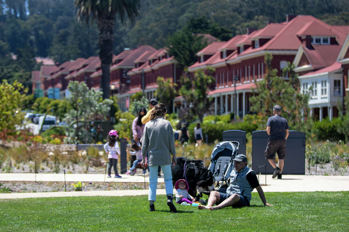 Visitors enjoy a meadow at the Presidio Tunnel Tops in the Presidio on in San Francisco, Calif.  on July 16, 2022.