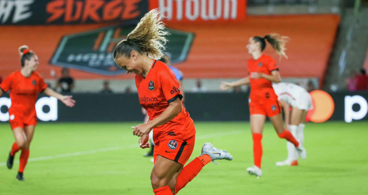 HOUSTON TX JULY 16: Houston Dash forward Ebony Salmon (11) celebrates after scoring her third goal and getting a hat trick in the second half during the NWSL match between the Chicago Red Stars and Houston Dash at PNC Stadium in Houston, Texas.
