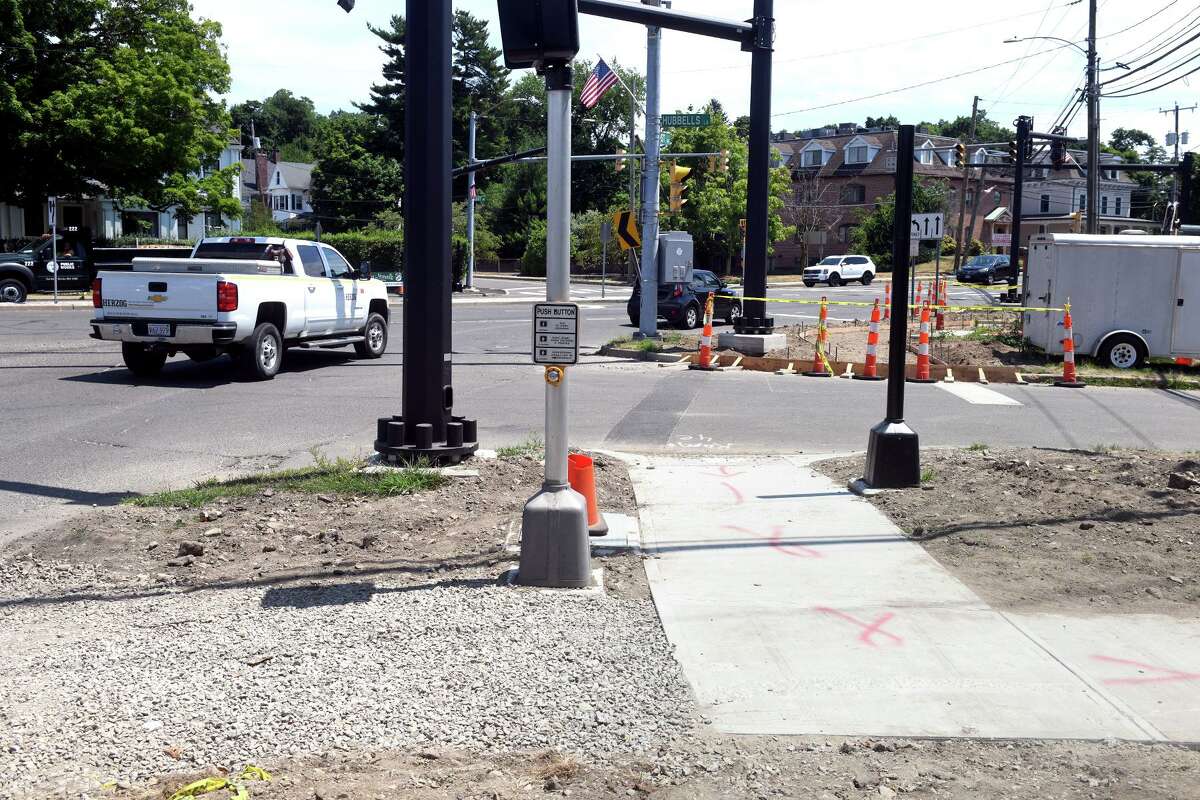 A sidewalk construction project where East Ave. and East Wall St. meet at Hubbells Ln., in Norwalk, Conn. July 15, 2022.