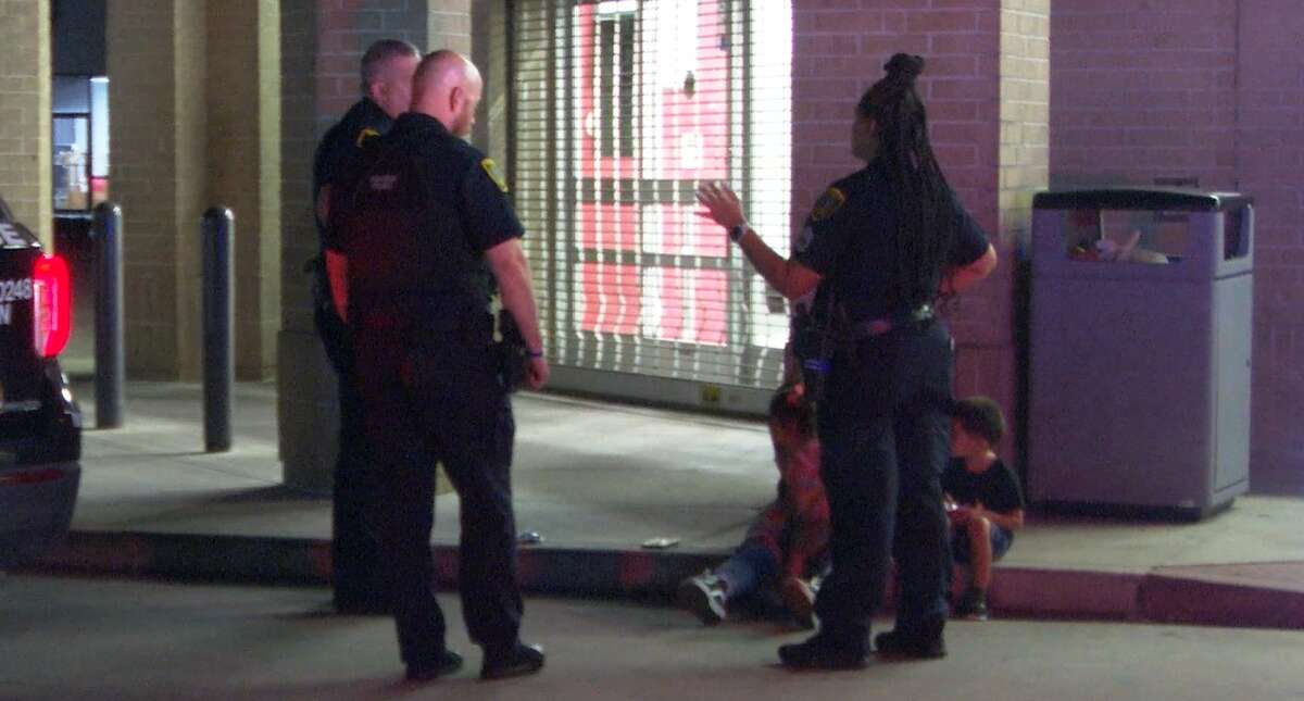 Houston police at the scene where a mother was found allegedly trying to abandon two children July 17, 2022, in the 6600 block of Airline Drive.