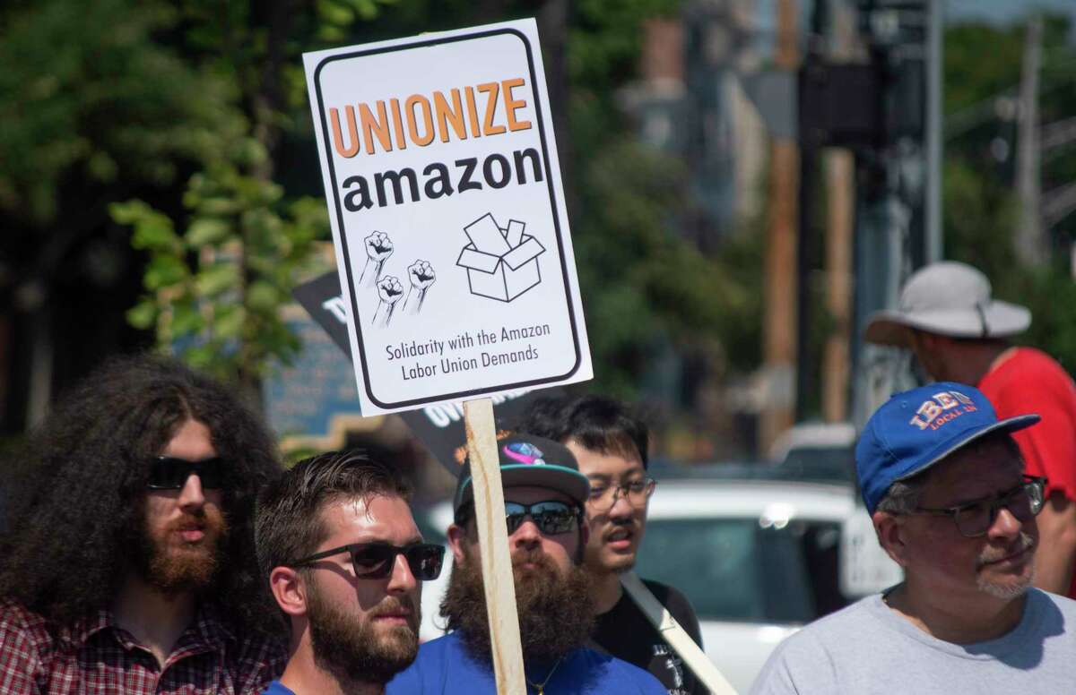 People gather at Townsend Park for an event held to announce the start of a unionizing campaign for the workers at the Amazon Schodack warehouse on Sunday, July 17, 2022, in Albany, N.Y. (Paul Buckowski/Times Union)