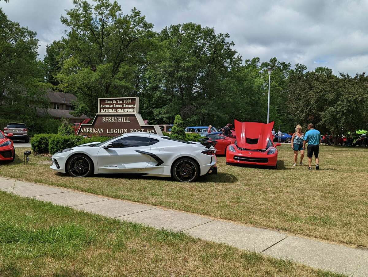 People gather to view vintage cars during Midland's Berryhill American