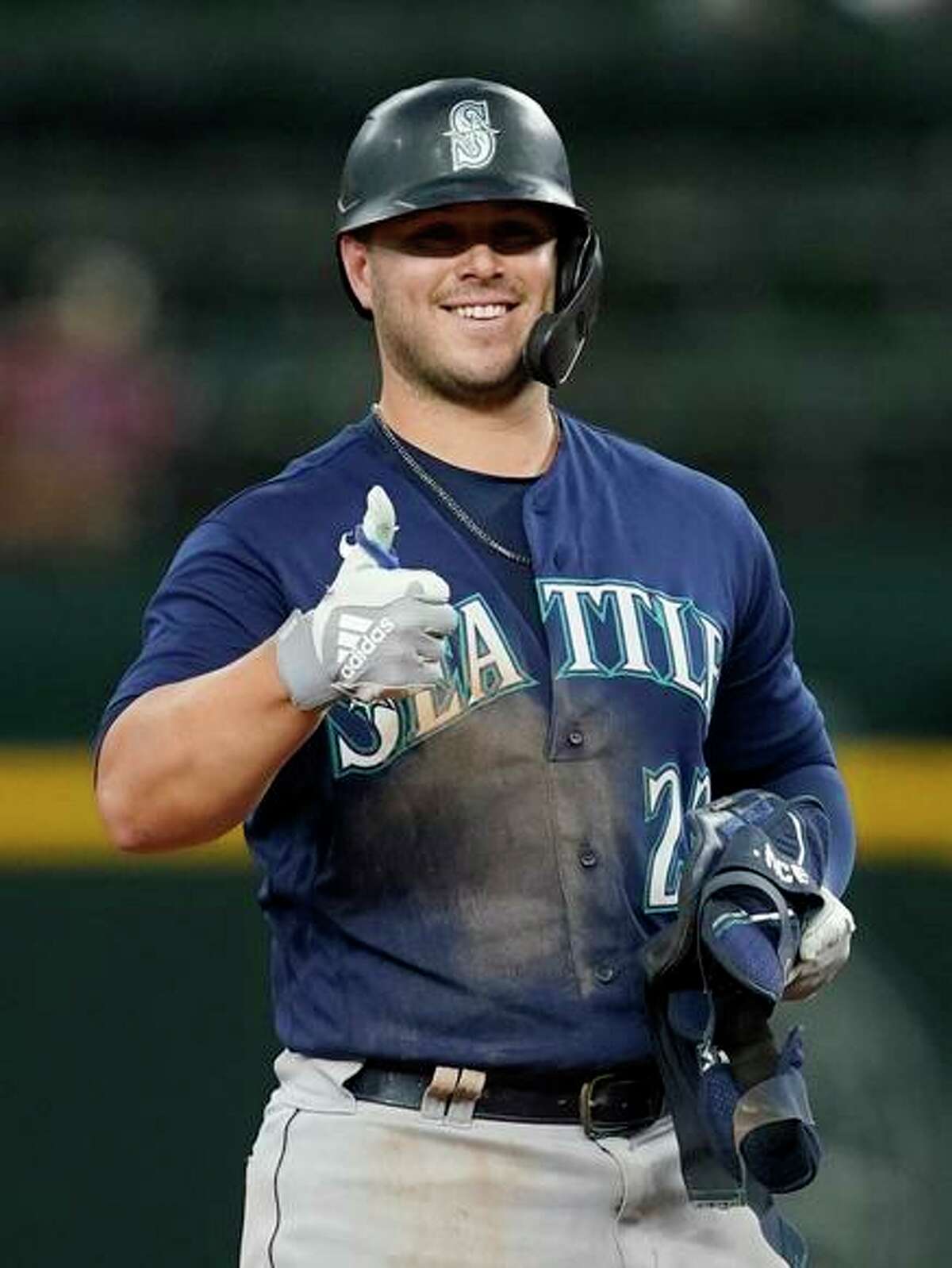 Mariners first baseman Ty France celebrates his double in the ninth inning.