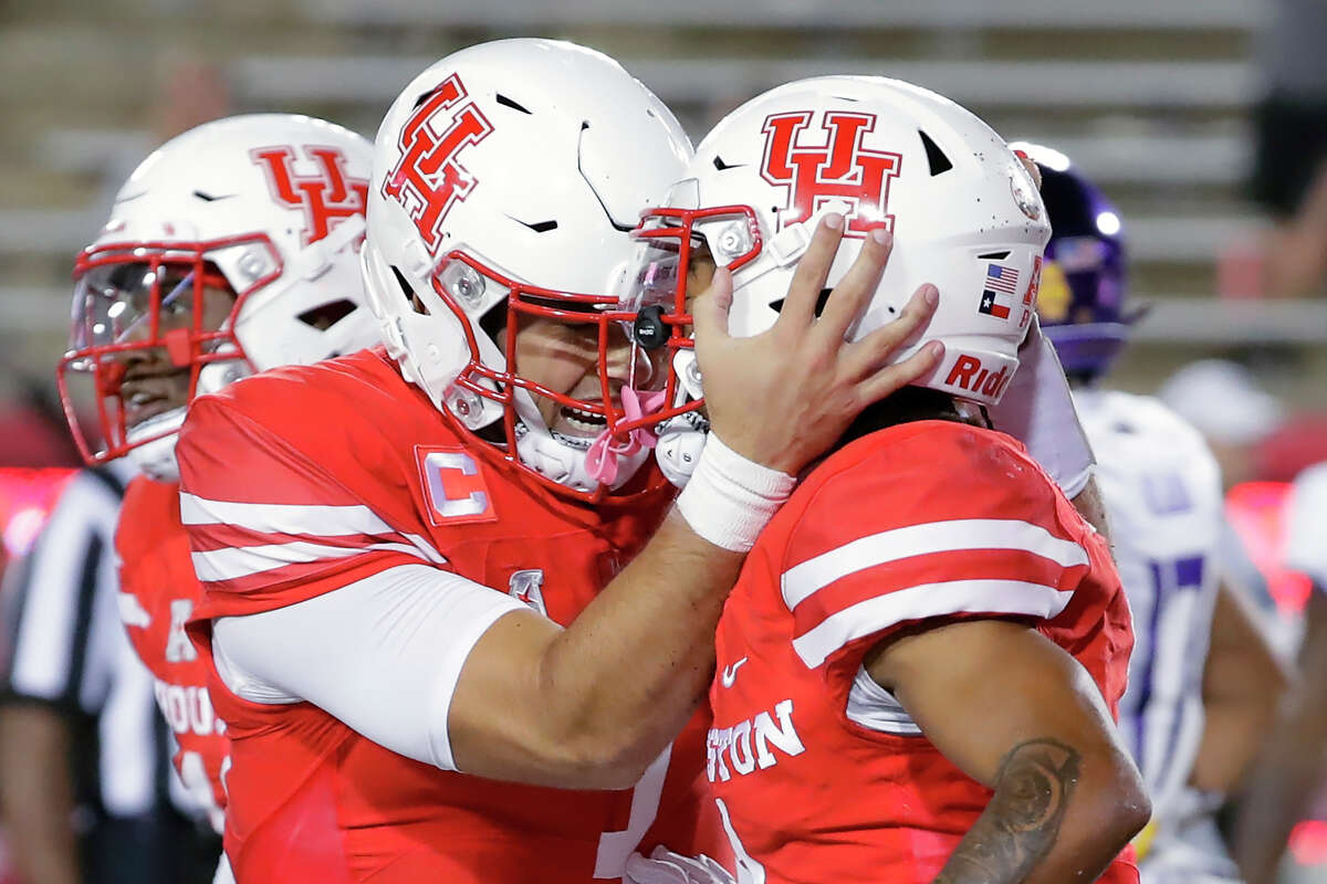 UH quarterback Clayton Tune, left, and wide receiver Nathaniel Dell were among five players named to the All-AAC first team. 