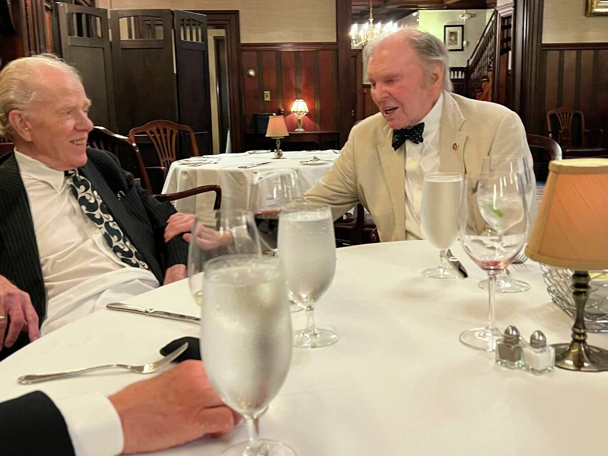 Writers and Capital Region residents William Kennedy, left, and Bernard Conners at a recent dinner together at the Fort Orange Club in Albany.