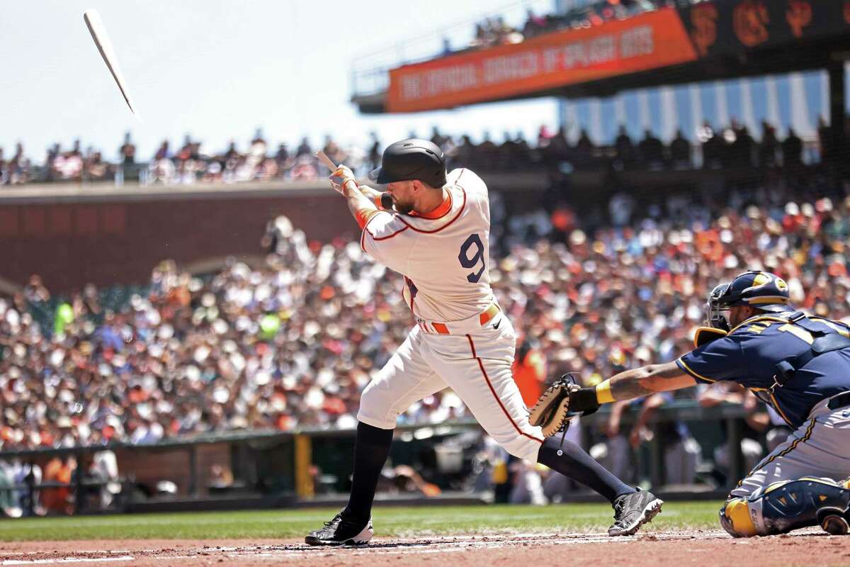San Francisco Giants' Brandon Belt hits an RBI broken bat single in in the second inning against Milwaukee Brewers during a baseball game in San Francisco, on Sunday, July 17, 2022. (Scott Strazzante/San Francisco Chronicle via AP)