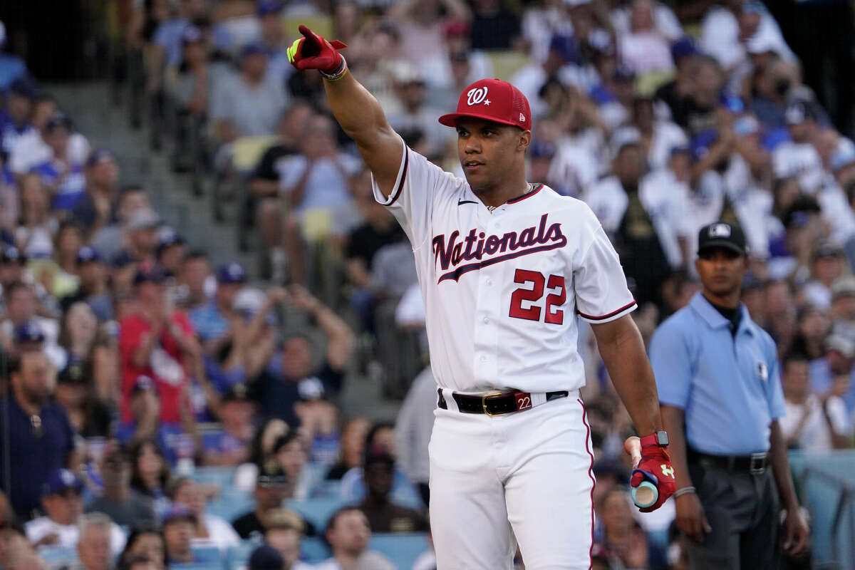 National League's Juan Soto, of the Washington Nationals, points during the MLB All-Star baseball Home Run Derby, Monday, July 18, 2022, in Los Angeles. (AP Photo/Mark J. Terrill)