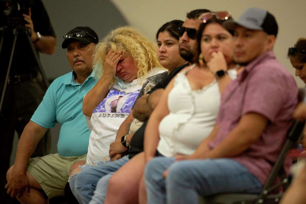 Mary Grace Valencia, far left, of San Angelo, an aunt of victim Uziyah Sergio Garcia, rubs her head as she sits with members of Uziyah’s family including his father, step-mother, aunt and uncle, during a press conference after the viewing of the video from inside Robb Elementary School and a briefing on the Texas House Investigative Committee’s preliminary report on the shooting, at the Ssgt. Willie de Leon Civic Center in Uvalde, Texas on Sunday, July 17, 2022.