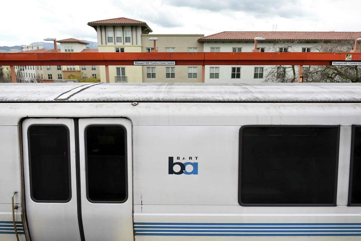 A train stops on the platform at the Pleasant Hill BART Station. BART service was stopped Tuesday morning. between the transit agency’s Concord and Pleasant Hill stations due to a grass fire.