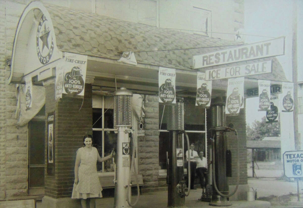 The exterior of Luther Grocery in the mid-1930s with Helen Campbell, who owned the store with her husband Larry.