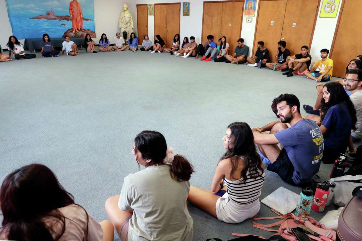Camp counselors meet at a Hindu Temple on the campus of Star Pipe Products Sunday, Jul. 17, 2022 in Houston, TX.
