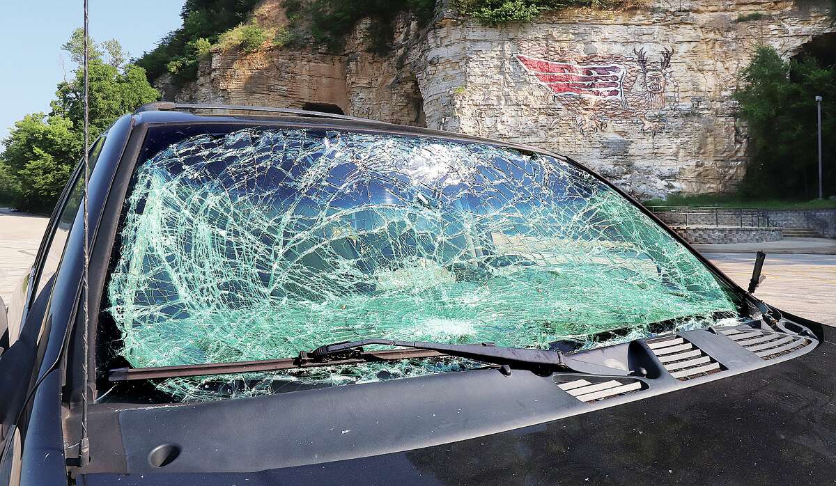 John Badman|The Telegraph Visitors to the Piasa Bird, a popular tourist attraction in Alton, were met Tuesday by a vandalized SUV on the parking lot.