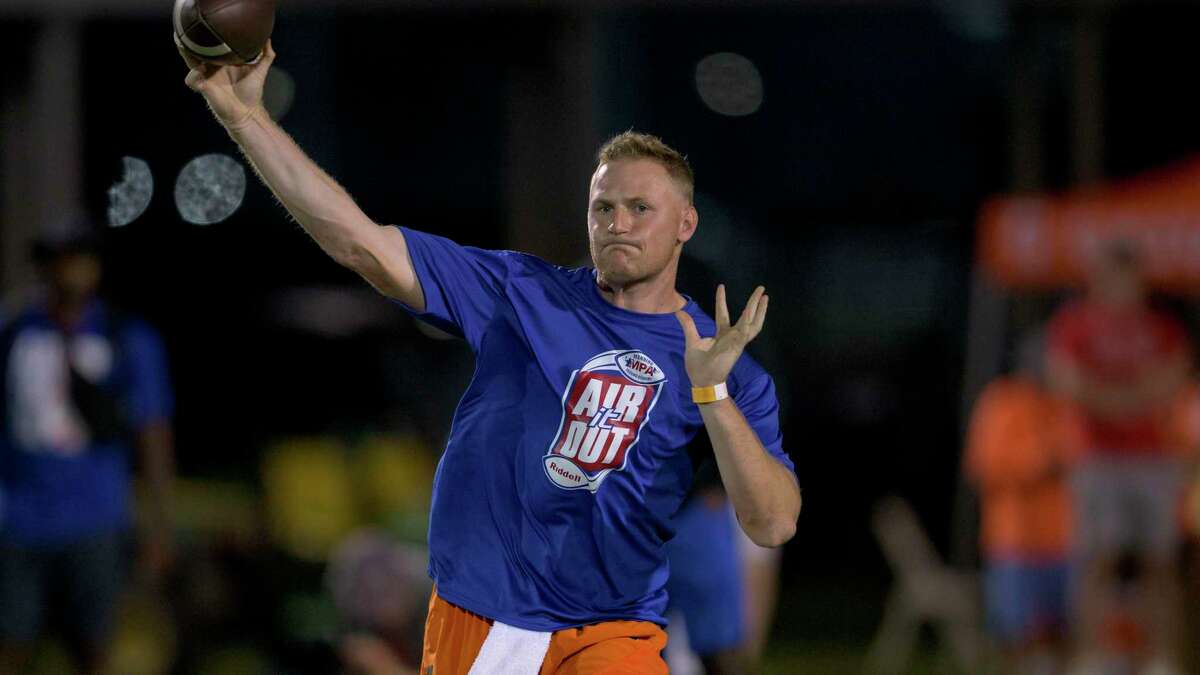 Miami quarterback Tyler Van Dyke throws at the Manning Passing Academy on the Nicholls State University campus in Thibodaux, La. Friday, June 24, 2022. Van Dyke was named to the preseason watch list for both the Davey O’Brien Award and the Maxwell Award. (AP Photo/Matthew Hinton)