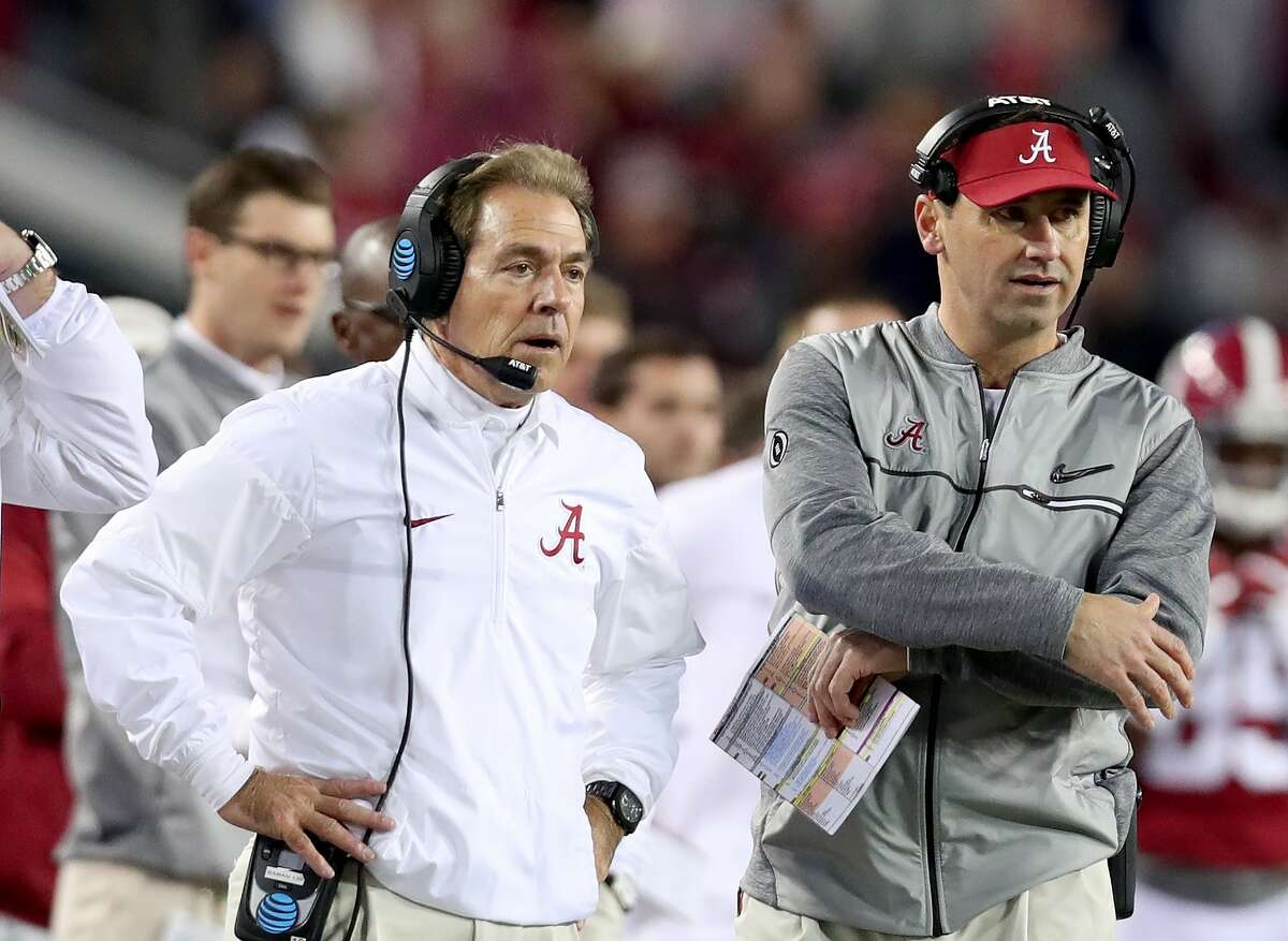 Nick Saban's last national title at Alabama in 2020 came with current Texas coach Steve Sarkisian, right, as his offensive coordinatorl