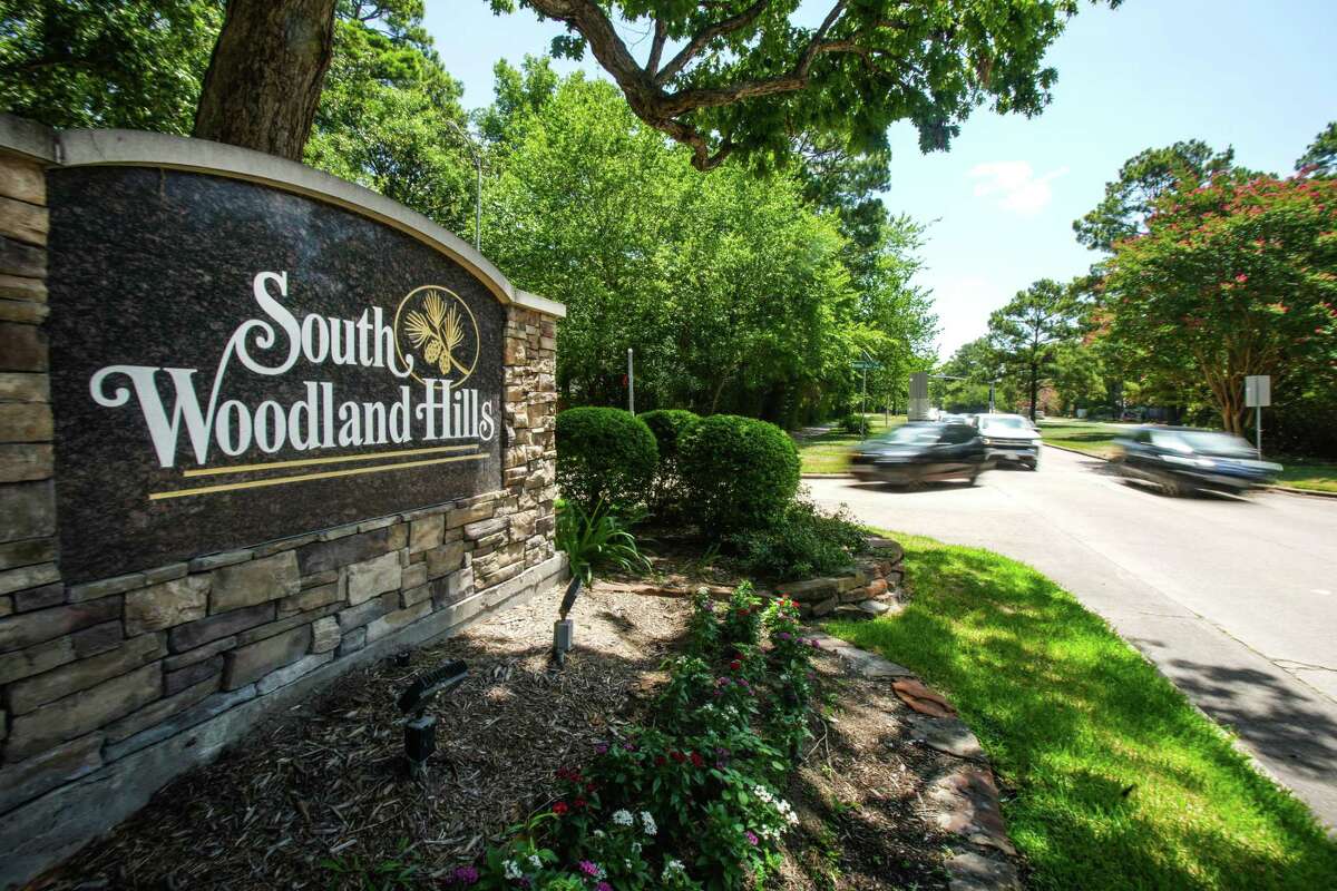 The entrance to the Woodland Hills Village subdivision, pictured on Tuesday, July 19, 2022, in Kingwood, where police are investigating an incident in which racist notes were left on the doorstep of a Black family’s home.