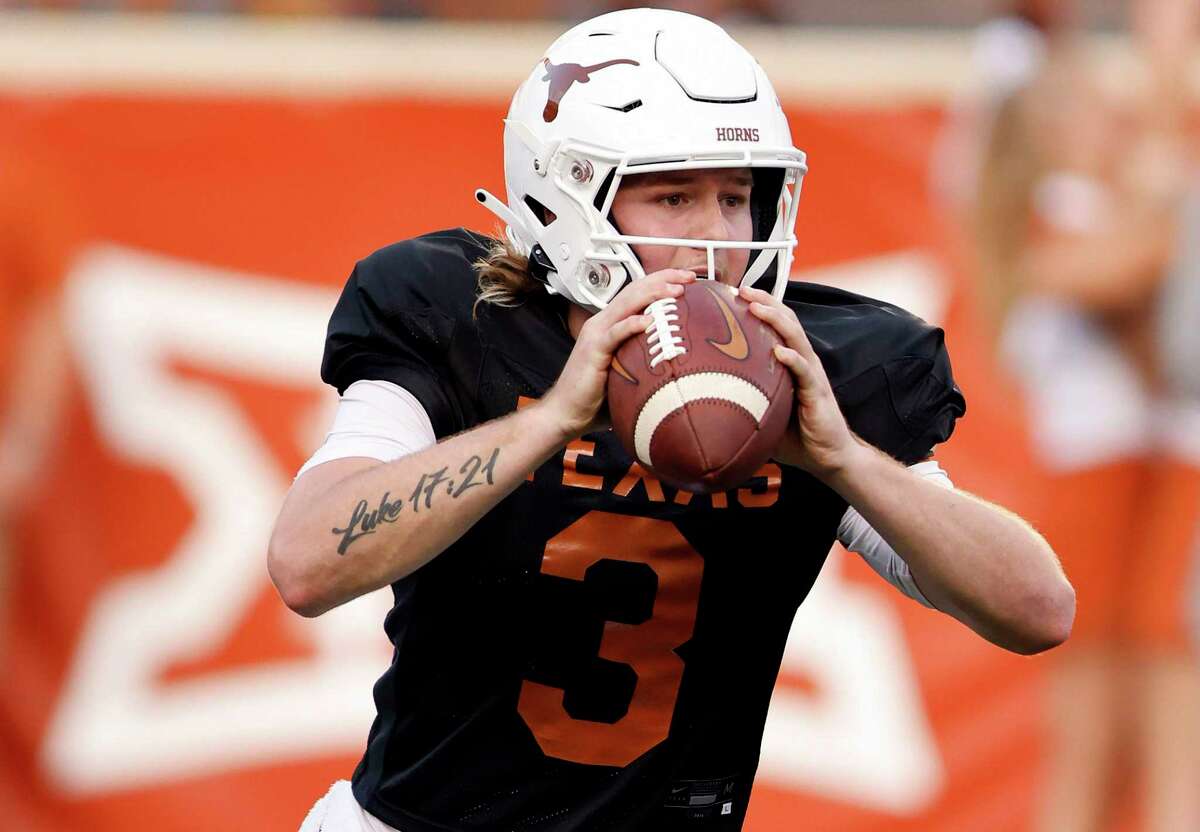 Redshirt freshman Quinn Ewers remains locked in a quarterback duel with Hudson Card after Texas’ scrimmage at Royal-Memorial Stadium on Tuesday.