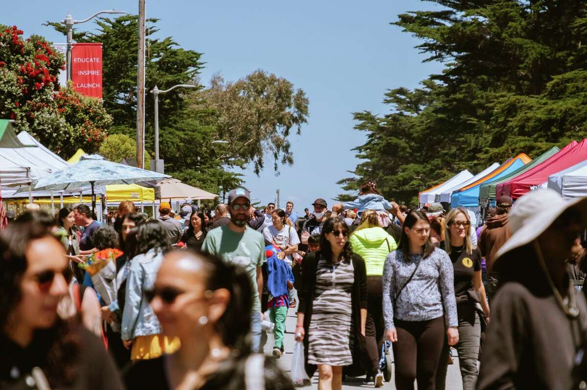Many gather at The Outer Sunset Farmers Market & Mercantile in San Francisco, Calif., on Sunday, June 19, 2022.
