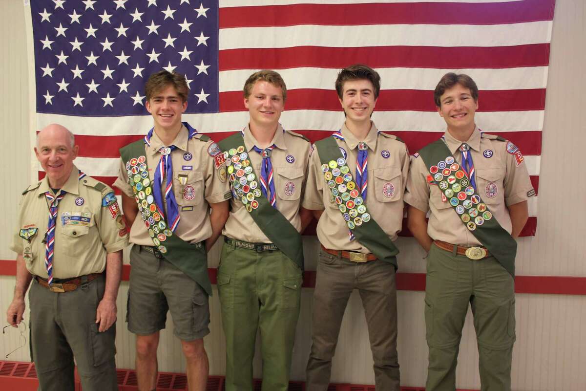 Darien Scout Troop 53 holds an Eagle Scout celebration to mark the accomplishments of Tate Hanson, Eric Morgan, Jack Piersol and Cormac Brown, who earned the highest rank in Scouting over the past two years. Troop 53 Eagles Scoutmaster Grant Evans is shown with Brown, Morgan, Piersol and Hanson.