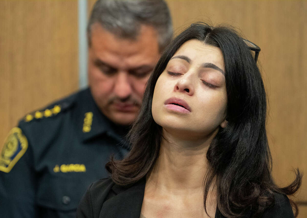 April Aguirre, aunt of Arlene Alvarez, 9, who died after being shot in February of this year, listens during a press conference, Tuesday, July 19, 2022, at Crime Stoppers in Houston. A grand jury has declined to indict a Houston man on charges related to the death of 9-year-old Arlene Alvarez, who was inadvertently shot by the man after he was robbed and fired his weapon into the Alvarezâs car. Crime Stoppers has presser seeking information on the robber related to the shooting.