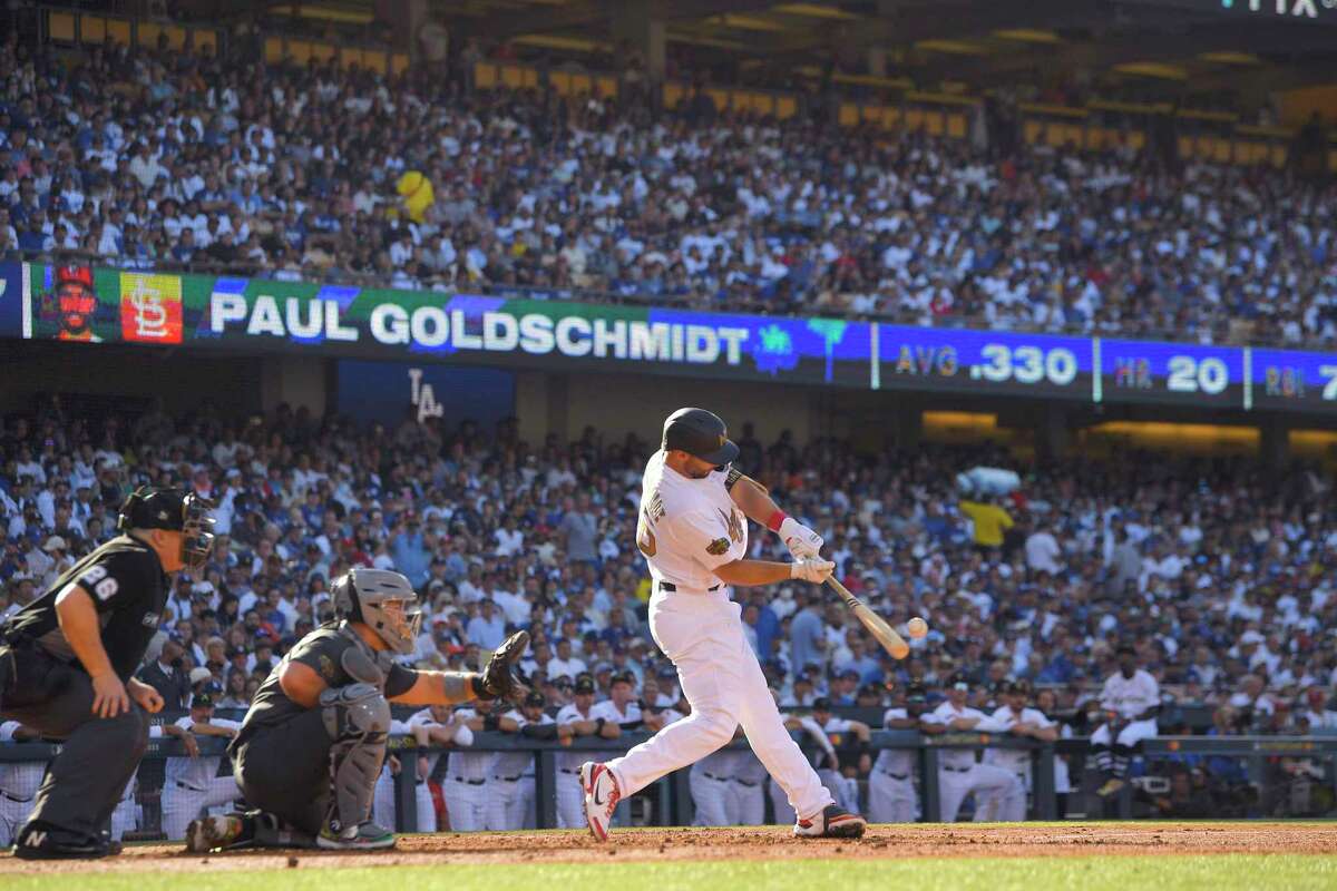 National League's Paul Goldschmidt, of the St. Louis Cardinals, connects for a solo home run off American League pitcher Shane McClanahan, of the Tampa Bay Rays, during the first inning of the MLB All-Star baseball game, Tuesday, July 19, 2022, in Los Angeles. (AP Photo/Mark J. Terrill)