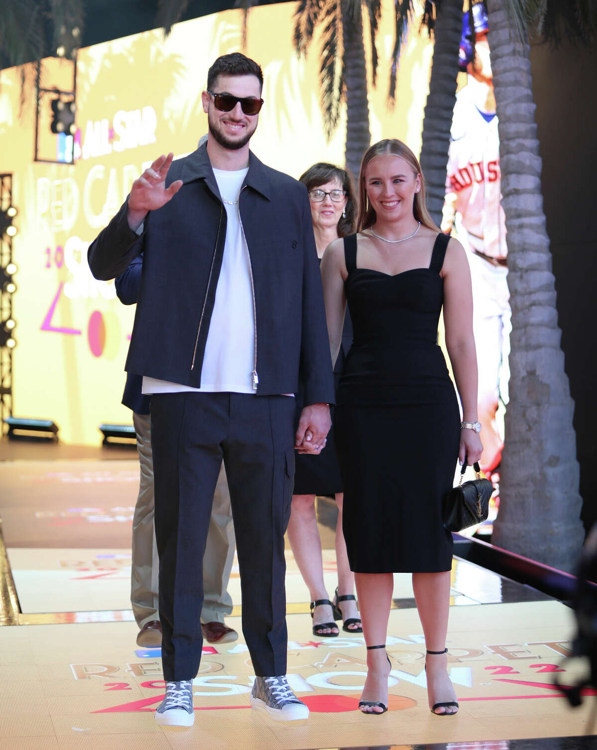 Astros right fielder Kyle Tucker and girlfriend Samantha Scott arrive at The 2022 MLB All-Star Game Red Carpet Show at XBOX Plaza on July 19, 2022 in Los Angeles, California.
