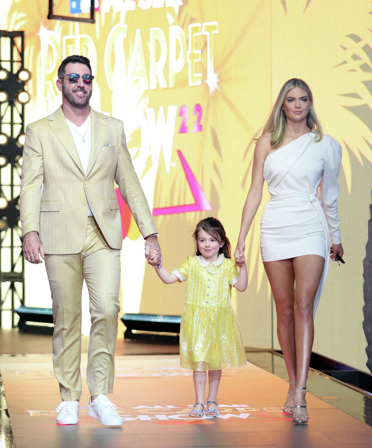 Astros pitcher Justin Verlander, his wife Kate Upton and their daughter Genevieve arrive at The 2022 MLB All-Star Game Red Carpet Show at XBOX Plaza on July 19, 2022 in Los Angeles, California.