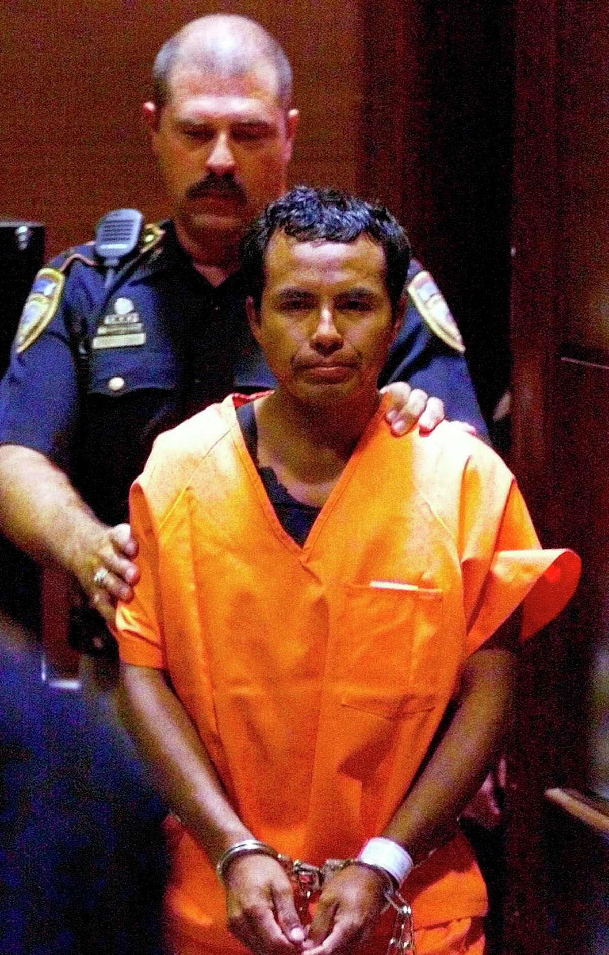 Serial killer Angel Maturino Resendiz is escorted into a Harris County Courtroom by for a hearing on July 14, 1999, in Houston. Since his arrest the man known as the "Railroad Killer" has given authorities crucial details that have helped close four murder cases in three states, including one in which another man had been charged. 