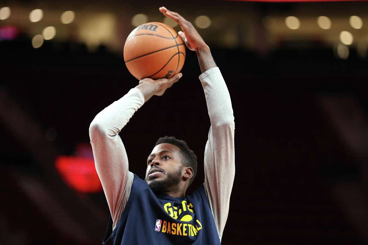 PORTLAND, OREGON - FEBRUARY 27 2022: JaMychal Green #0 of the Denver Nuggets warms up before the game against the Portland Trail Blazers at Moda Center on February 27, 2022 in Portland, Oregon. (Photo by Abbie Parr/Getty Images)