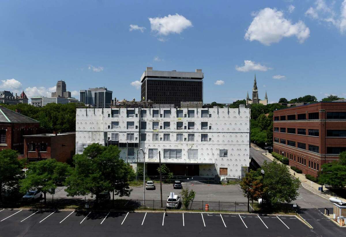 Work has resumed on the Quackenbush Square project off Broadway on Wednesday, July 20, 2022, in Albany, N.Y. Quackenbush Square was slated to be an eight-story 132-room Hyatt Place hotel and a 134-unit apartment building. Work halted in 2020 during the pandemic lockdown.