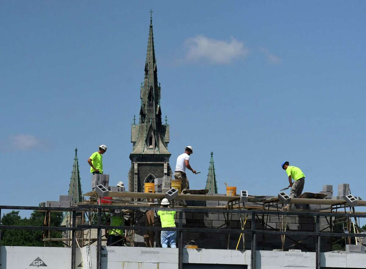 Work has resumed on the Quackenbush Square project off Broadway on Wednesday, July 20, 2022, in Albany, N.Y. Quackenbush Square was slated to be an eight-story 132-room Hyatt Place hotel and a 134-unit apartment building. Work halted in 2020 during the pandemic lockdown.