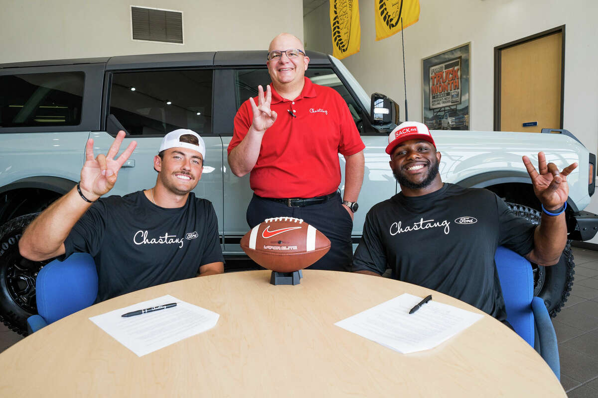 Chastang Ford general manager Patrick Chastang, a UH alum and supporter, said he was in "a wait-and-see game with NIL" before entering a partnership with Cougars football players Clayton Tune (left) and Donavan Mutin. The deal is a first of its kind for UH athletes.