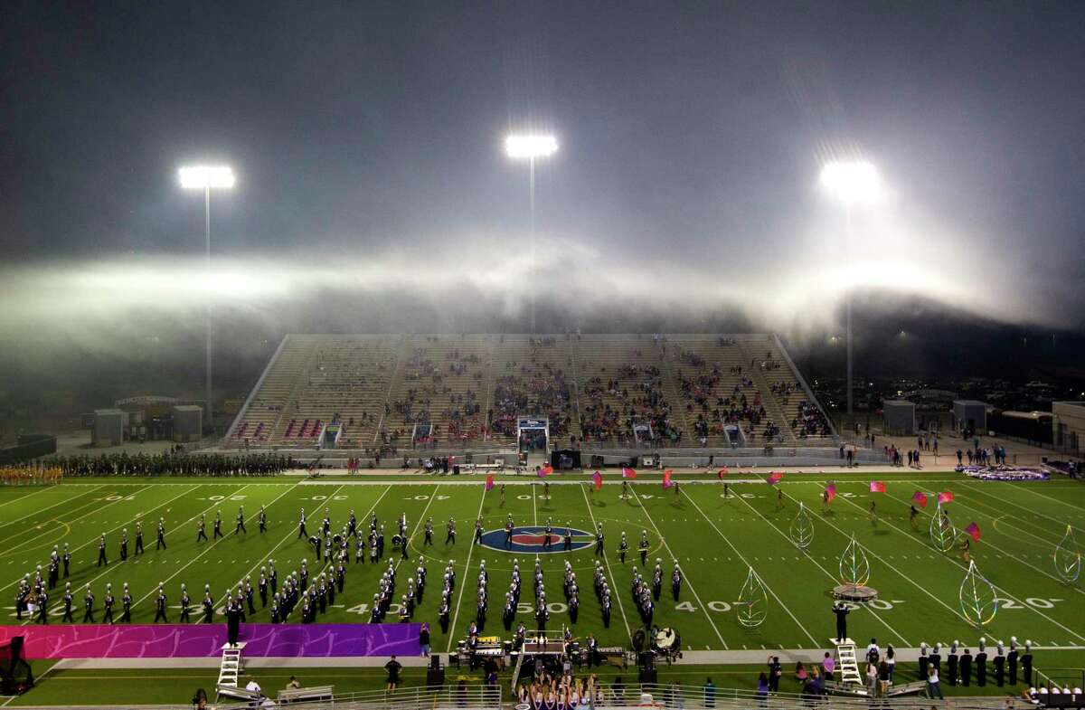 Fogs sits above The Woodlands High School band during halftime of a District 13-6A high school football game at Woodforest Bank Stadium, Thursday, Oct. 7, 2021, in Shenandoah.