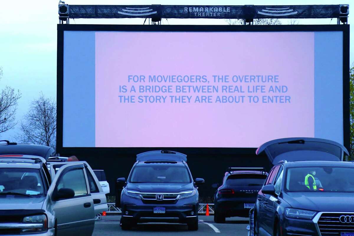 A message for viewers at the new, larger screen at the Remarkable Theater's drive-in showing of "Goonies" on Friday, Apri. 16, 2021, in Westport, Conn.
