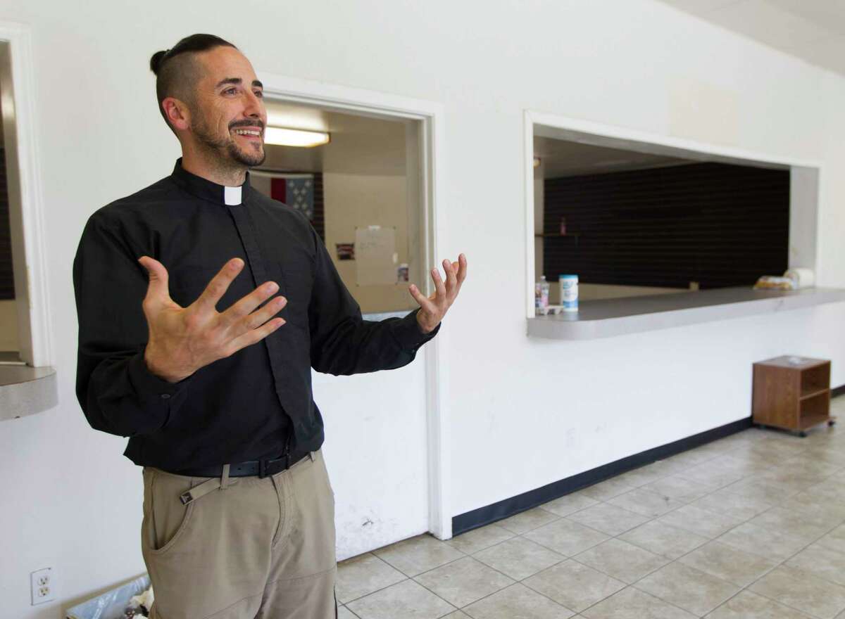 Sean Steele, pastor of St. Isidore Episcopal Church, gives a tour of the church’s food pantry and event space. To continue growing both the church and its nonprofit Abundant Harvest Kitchen, the organization is hosting its first gala fundraiser in August.